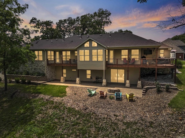 13518 Pikes Peak Pl, Rogers, AR 72756 - back of house with a patio area, a fire pit, a yard, and a wooden deck