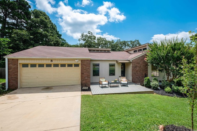view of front of house featuring brick siding, concrete driveway, and a garage
