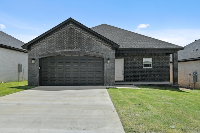 7213 Stonehenge Dr, Sherwood, AR 72120 - french country home with brick siding, driveway, a garage, a front yard, and a shingled roof