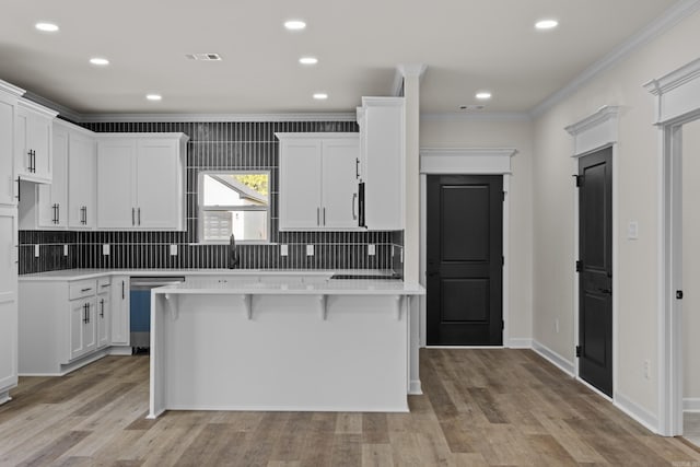 7213 Stonehenge Dr, Sherwood, AR 72120 - kitchen with dishwasher, crown molding, decorative backsplash, light countertops, and white cabinetry