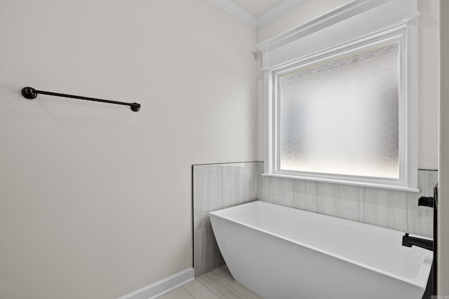 7213 Stonehenge Dr, Sherwood, AR 72120 - bathroom with a soaking tub and crown molding