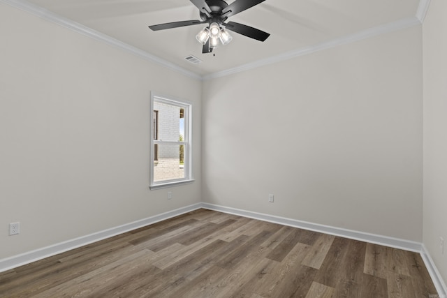 7213 Stonehenge Dr, Sherwood, AR 72120 - empty room featuring wood finished floors, crown molding, and a ceiling fan