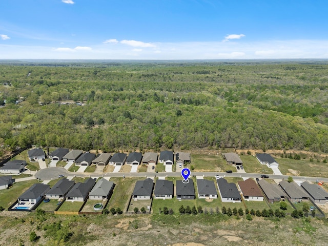 7213 Stonehenge Dr, Sherwood, AR 72120 - view of property location featuring a forest and nearby suburban area