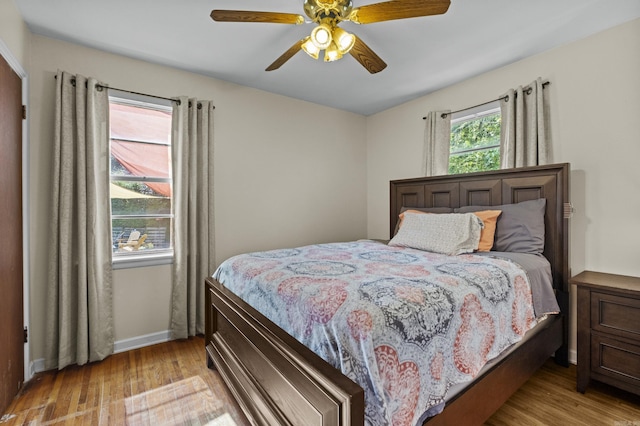 4005 W Berkley Dr, North Little Rock, AR 72118 - bedroom with light wood-style flooring and ceiling fan