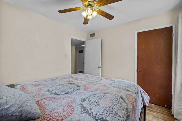4005 W Berkley Dr, North Little Rock, AR 72118 - bedroom featuring wood finished floors and a ceiling fan