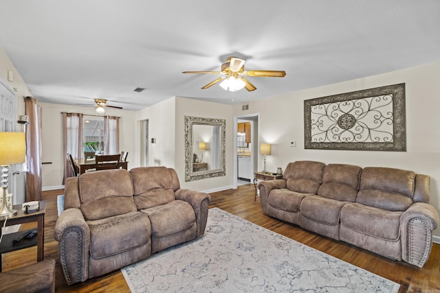 4005 W Berkley Dr, North Little Rock, AR 72118 - living area with ceiling fan and wood finished floors