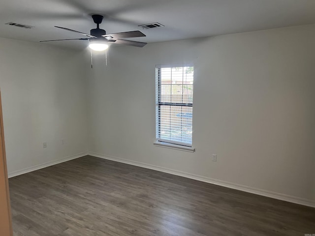 11 Laura Ln, Conway, AR 72034 - empty room with a ceiling fan and dark wood-style floors