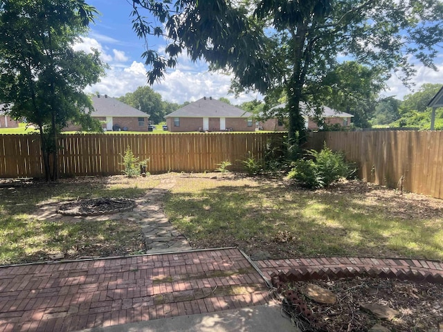11 Laura Ln, Conway, AR 72034 - fenced backyard featuring a patio