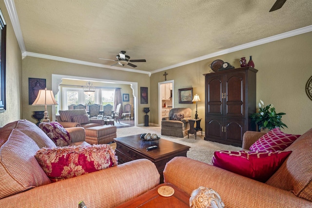 410 E Green St, Morrilton, AR 72110 - carpeted living room featuring ceiling fan, ornamental molding, and a textured ceiling