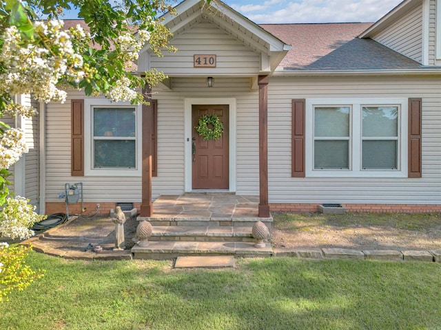 410 E Green St, Morrilton, AR 72110 - view of front of home featuring crawl space and roof with shingles