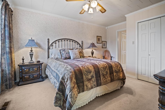 410 E Green St, Morrilton, AR 72110 - carpeted bedroom with ceiling fan, a closet, and ornamental molding