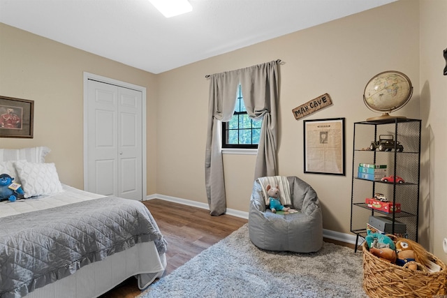 31 Deerfield Dr, Sherwood, AR 72120 - bedroom with wood finished floors and a closet