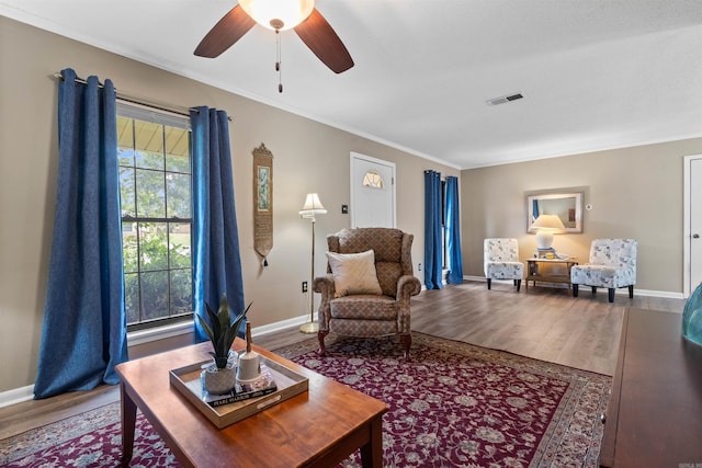 31 Deerfield Dr, Sherwood, AR 72120 - living area featuring crown molding, wood finished floors, and a ceiling fan