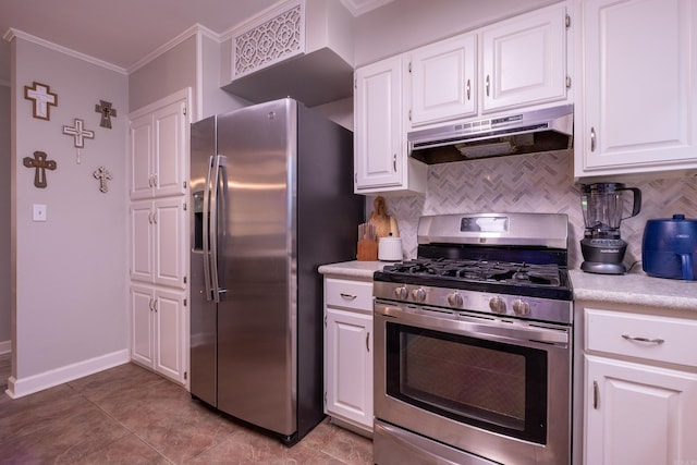 4203 Glenda Ln, Benton, AR 72019 - kitchen with appliances with stainless steel finishes, under cabinet range hood, crown molding, light countertops, and backsplash