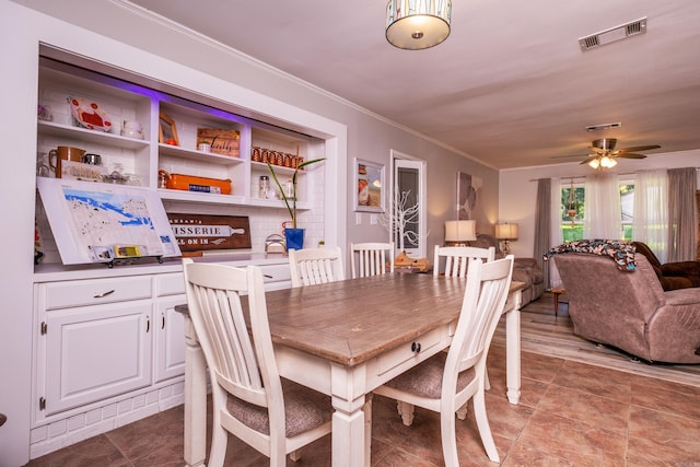 4203 Glenda Ln, Benton, AR 72019 - dining room with crown molding and a ceiling fan