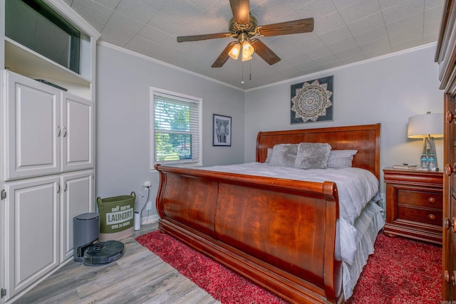 4203 Glenda Ln, Benton, AR 72019 - bedroom with crown molding, wood finished floors, and a ceiling fan