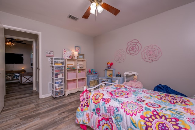 4203 Glenda Ln, Benton, AR 72019 - bedroom with wood finished floors and ceiling fan
