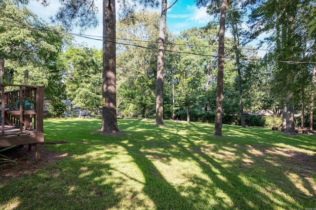 4203 Glenda Ln, Benton, AR 72019 - view of grassy yard featuring a wooden deck