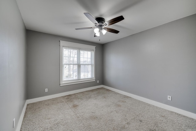 1005 S German Ln, Conway, AR 72034 - empty room featuring a ceiling fan and carpet flooring