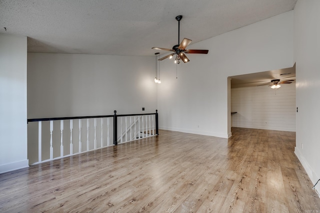 1005 S German Ln, Conway, AR 72034 - unfurnished room featuring ceiling fan and wood finished floors
