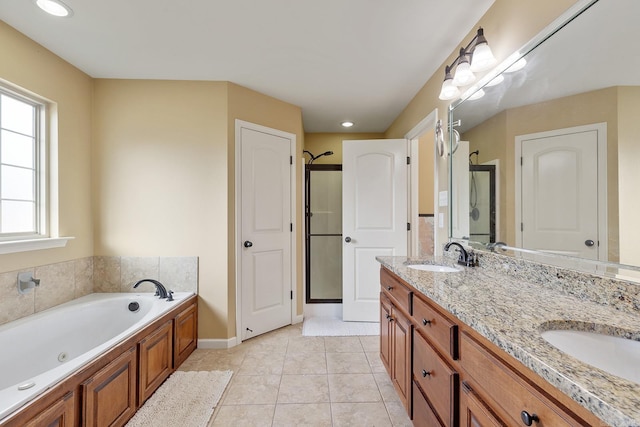 2104 Magna Carta Ln, Bryant, AR 72022 - full bathroom with a shower stall, a whirlpool tub, double vanity, and tile patterned flooring