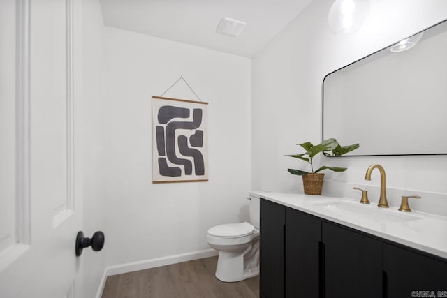 2616 Old Forge Dr, Little Rock, AR 72227 - bathroom featuring vanity and wood finished floors