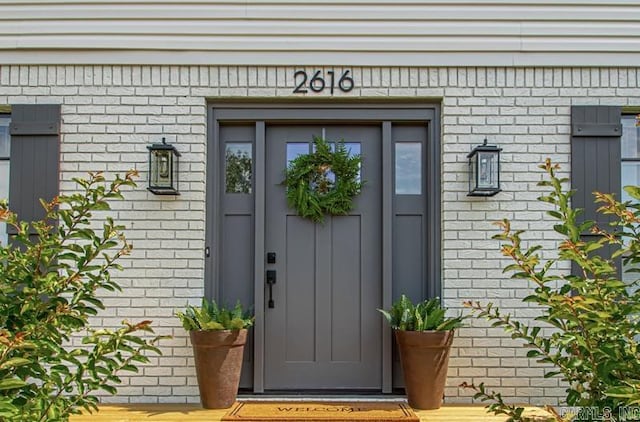 2616 Old Forge Dr, Little Rock, AR 72227 - view of exterior entry featuring brick siding