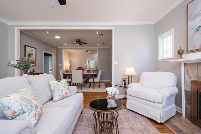 2222 N University, Little Rock, AR 72207 - living area featuring ceiling fan, wood finished floors, crown molding, a fireplace, and recessed lighting
