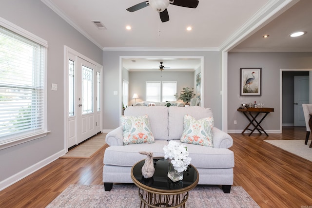 2222 N University, Little Rock, AR 72207 - living area with ceiling fan, wood finished floors, ornamental molding, and recessed lighting