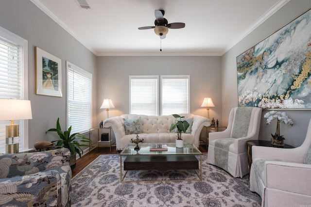 2222 N University, Little Rock, AR 72207 - living area featuring wood finished floors, ceiling fan, and ornamental molding