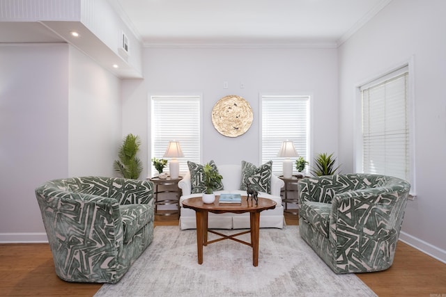 2222 N University, Little Rock, AR 72207 - sitting room featuring crown molding, wood finished floors, and plenty of natural light