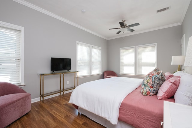 2222 N University, Little Rock, AR 72207 - bedroom with wood finished floors, multiple windows, ornamental molding, and ceiling fan