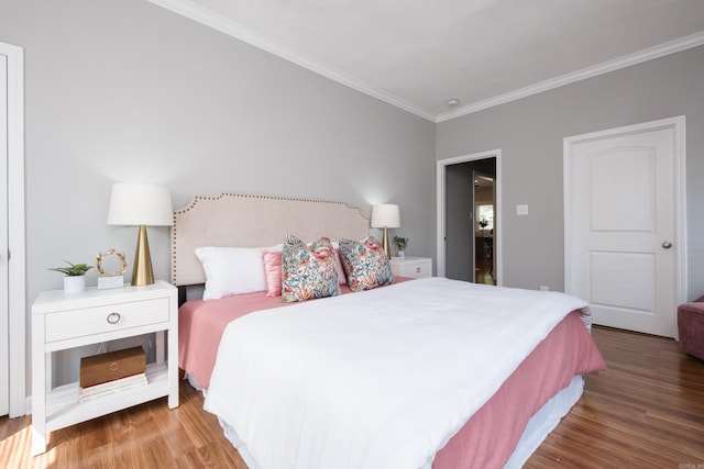 2222 N University, Little Rock, AR 72207 - bedroom with crown molding and wood finished floors