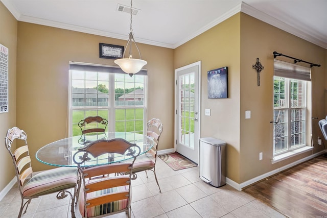 1700 Hosta, Conway, AR 72034 - dining room with crown molding and light tile patterned floors