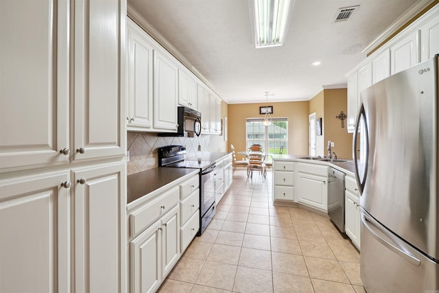 1700 Hosta, Conway, AR 72034 - kitchen featuring stainless steel appliances, white cabinetry, decorative backsplash, ornamental molding, and light tile patterned floors