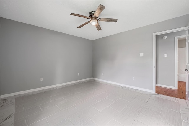1465 Pyramid Dr, Conway, AR 72034 - spare room featuring ceiling fan and baseboards