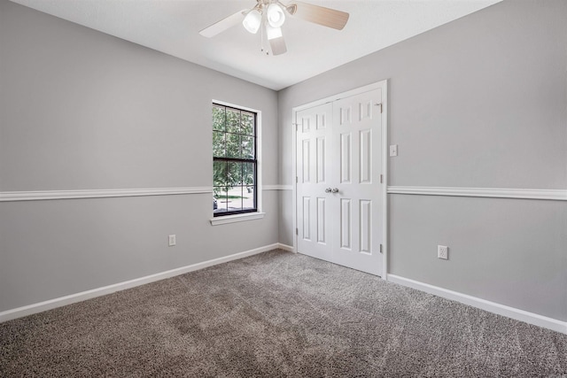 1465 Pyramid Dr, Conway, AR 72034 - unfurnished bedroom featuring carpet, a closet, and a ceiling fan