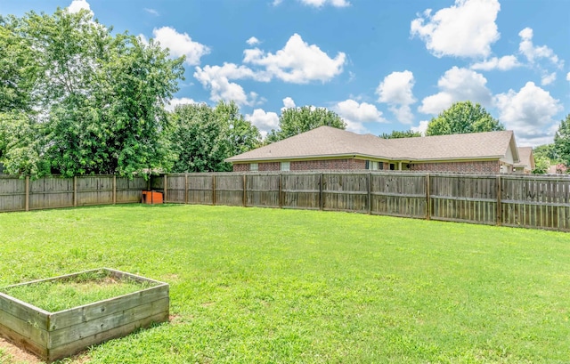 1465 Pyramid Dr, Conway, AR 72034 - fenced backyard featuring a garden