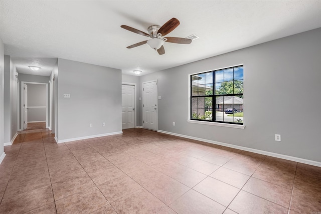 1465 Pyramid Dr, Conway, AR 72034 - spare room featuring a ceiling fan and light tile patterned floors