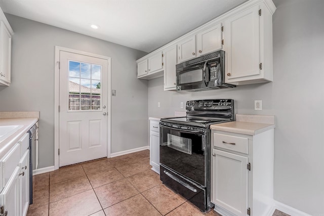 1465 Pyramid Dr, Conway, AR 72034 - kitchen with black appliances, light countertops, white cabinets, and recessed lighting