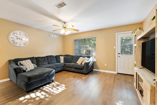 1410 Pyramid Dr, Conway, AR 72032 - living area with light wood-type flooring and a ceiling fan