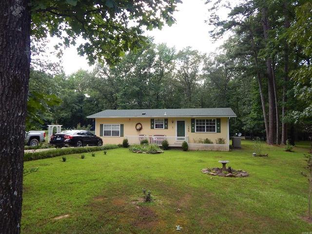155 N Ridge Rd, Heber Springs, AR 72543 - view of front of property with a front yard, a porch, and stucco siding
