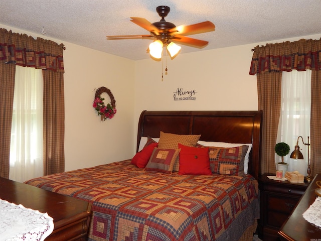 155 N Ridge Rd, Heber Springs, AR 72543 - bedroom with a textured ceiling and a ceiling fan