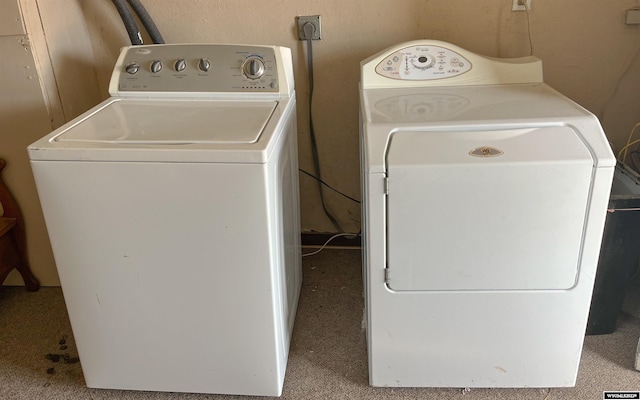 laundry room with light carpet, hookup for an electric dryer, and separate washer and dryer