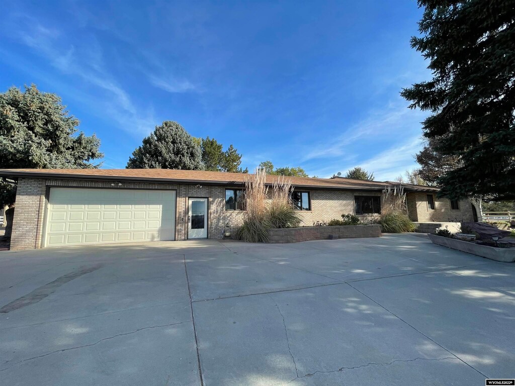 710 E 30th Ave, Torrington, WY 82240 - single story home with a garage