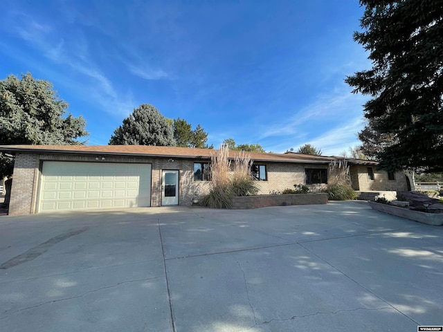 single story home with a garage