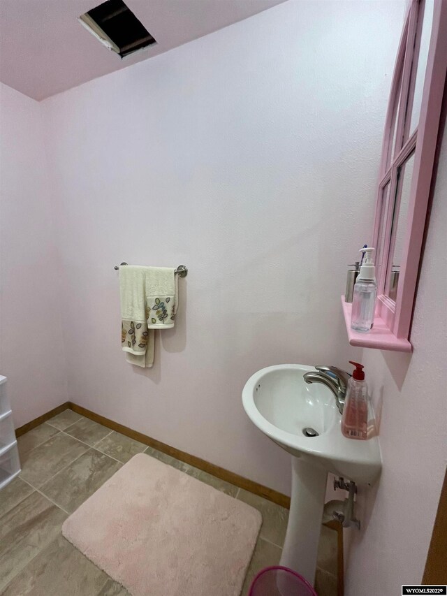 bathroom with tile floors