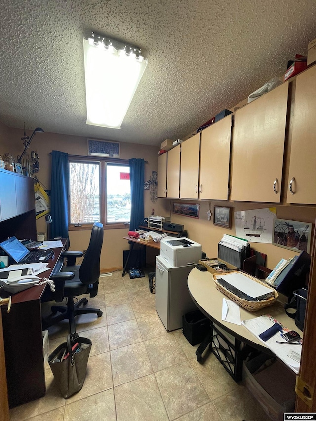 tiled office featuring a textured ceiling