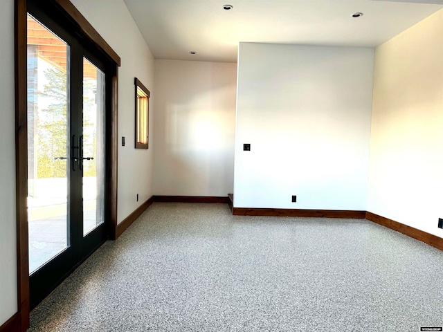 spare room with french doors