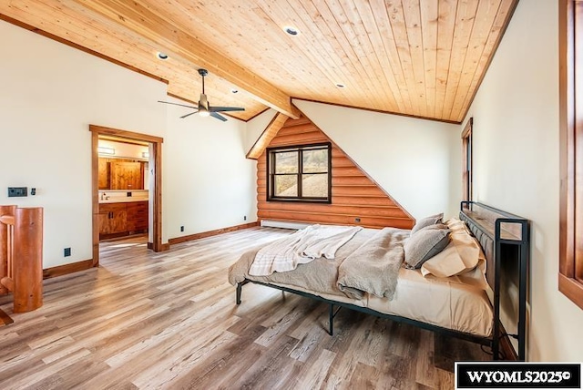 bedroom featuring ensuite bathroom, lofted ceiling with beams, light wood-type flooring, wooden ceiling, and ornamental molding